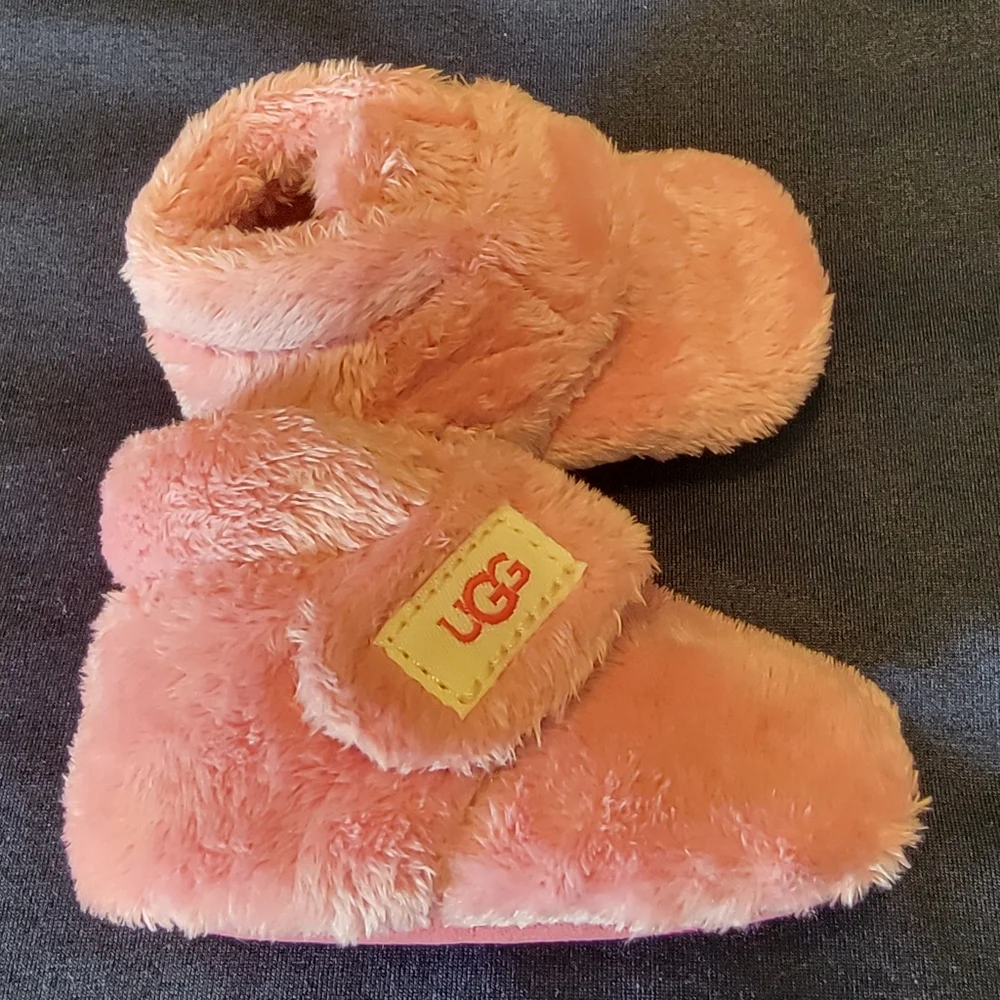 UGG Infant Pink Furry Slippers.   Size 0-1